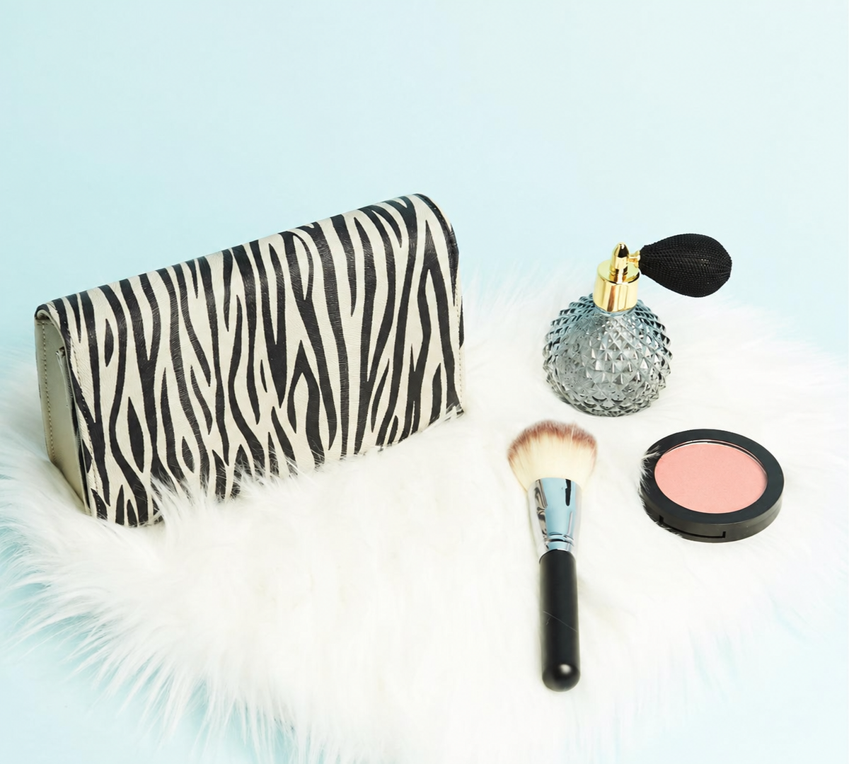 Daisy Rose zebra wallet and beauty accessories