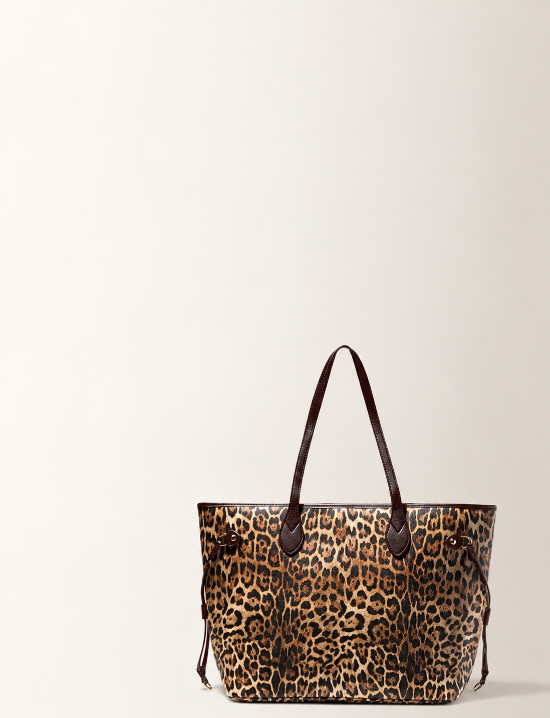 Leopard-print Daisy Rose tote on a warm ivory background