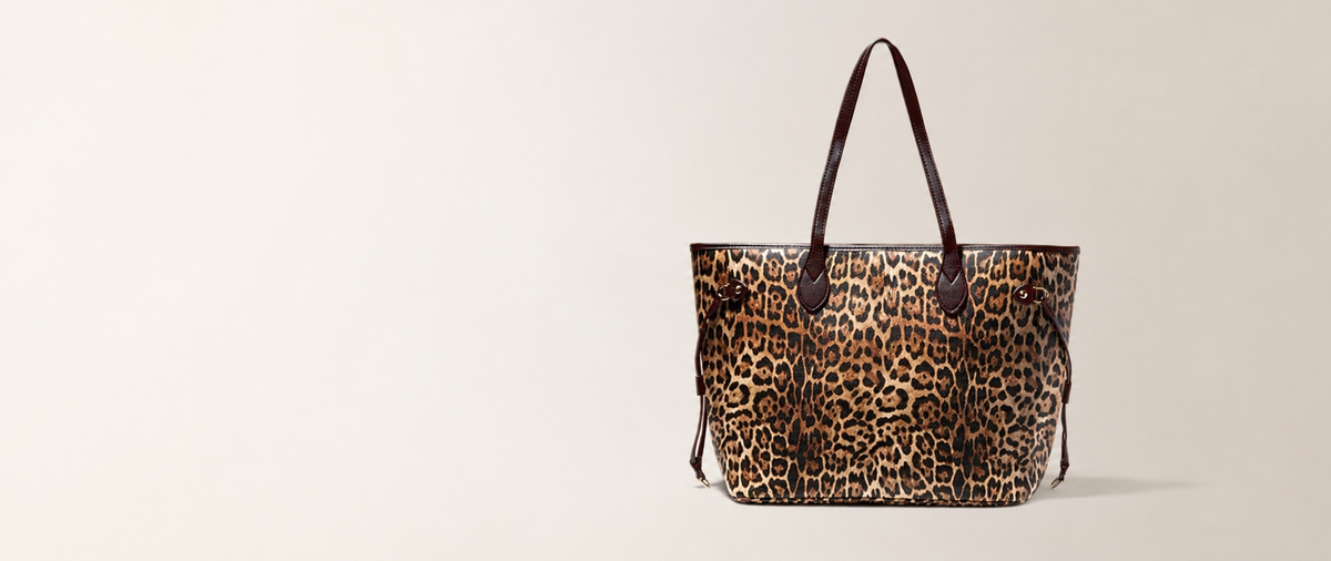 Leopard-print Daisy Rose tote on a warm ivory background